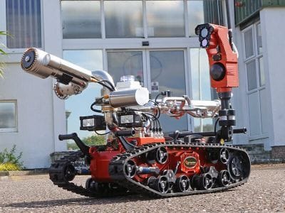 Avenger Fire UGV with water cannon during a firefighting demonstration